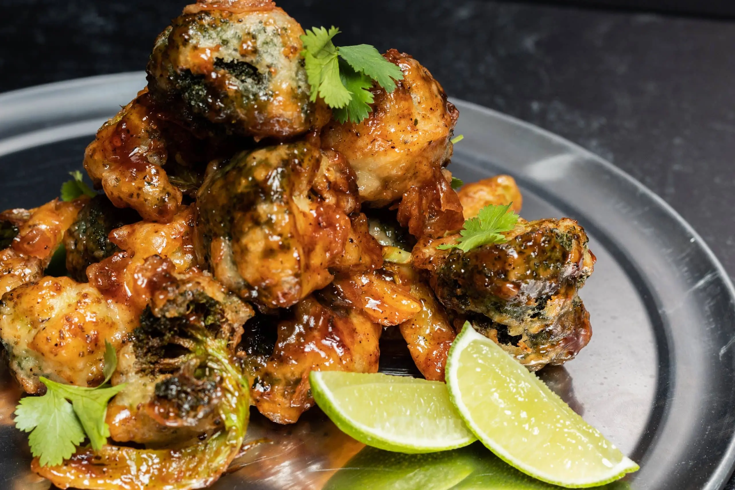 Beer Battered Broccoli, Jerk BBQ, Coconut Cream, Lime, and Cilantro.
