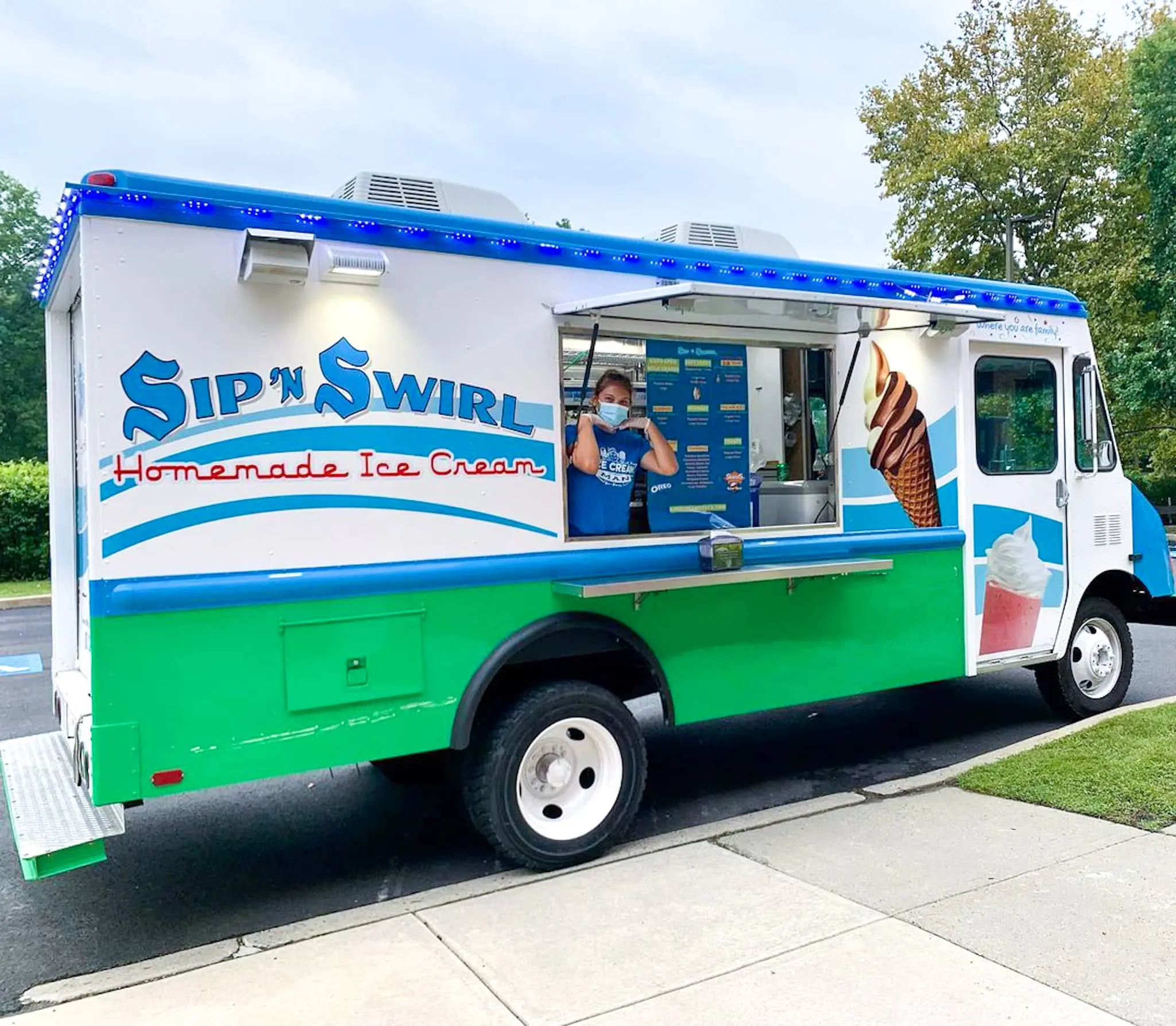 sip 'n swirl ice cream truck open for service on a summer day